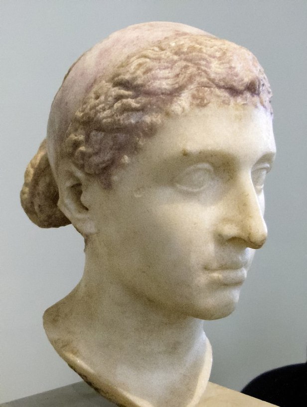 A roman bust of Cleopatra circa 43-40 BC, around or shortly after her visit to Rome. Thus perhaps the most approximate representation of her facial features.